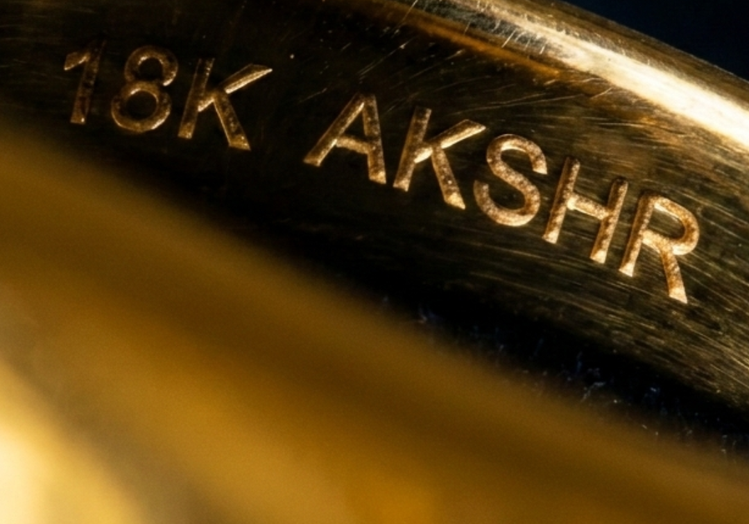 18K Gold band with AkshR branding