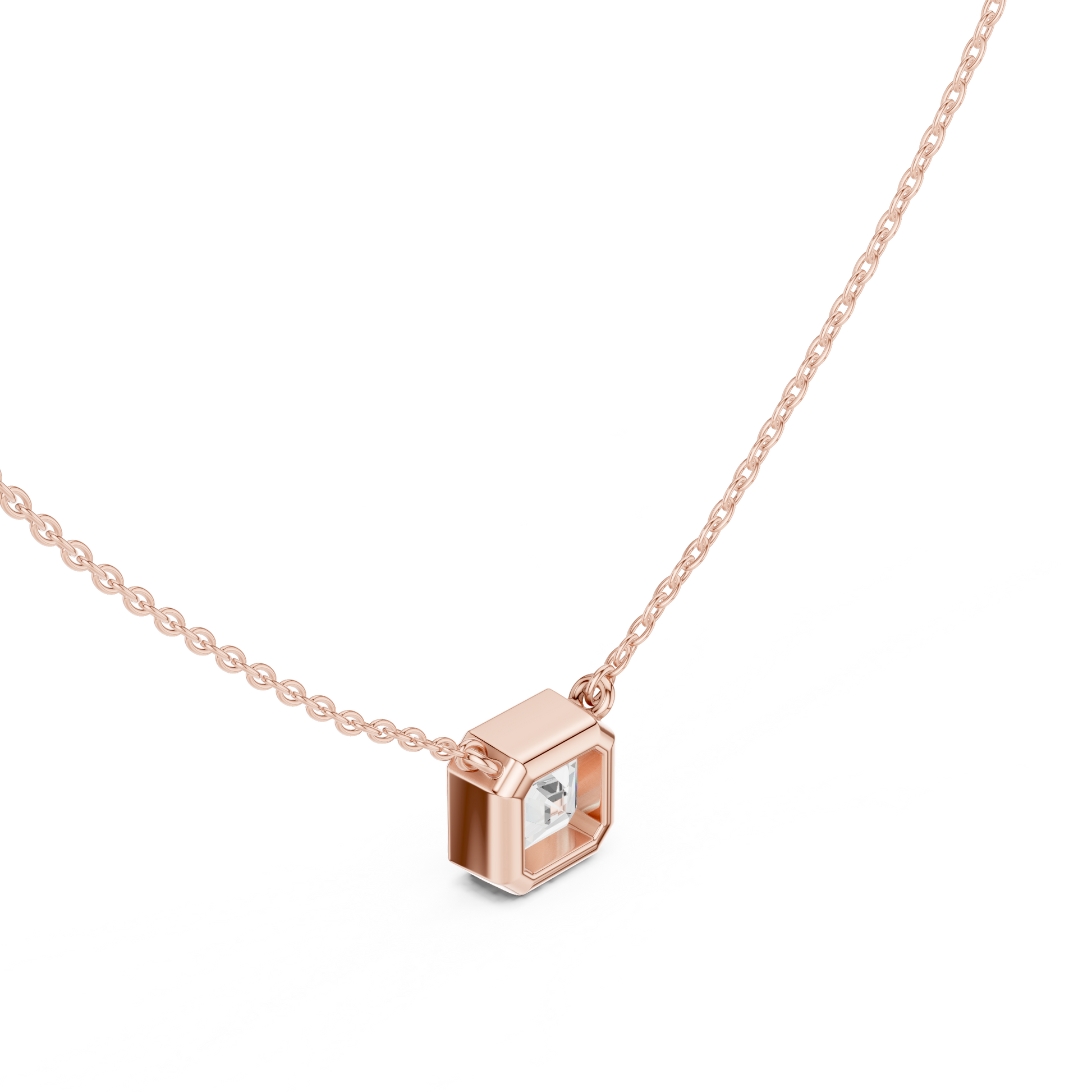 Gold necklace with a diamond pendant on a white background
