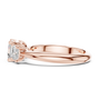 Rose gold ring with a diamond on a white background