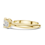 Gold ring with a diamond on a white background