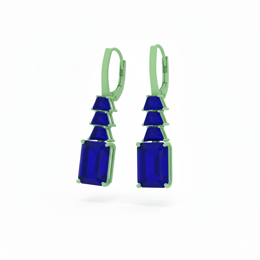 Pair of earrings with blue gemstones and green metal on a white background