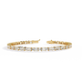 Gold bracelet with diamonds on a white background