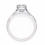 ring features a magnificent Emerald-cut diamond held in a refined prong setting