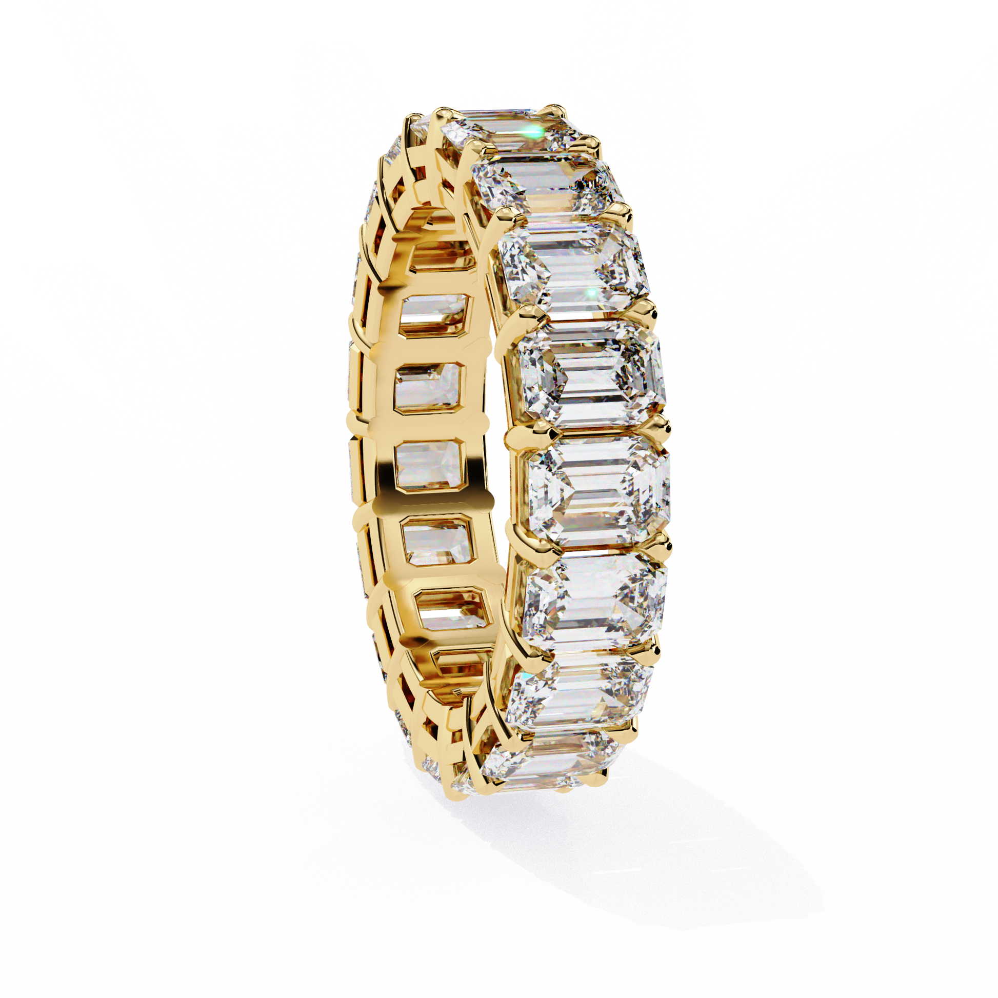 "tennis ring" features a continuous circle of magnificent Emerald-cut diamonds set vertically