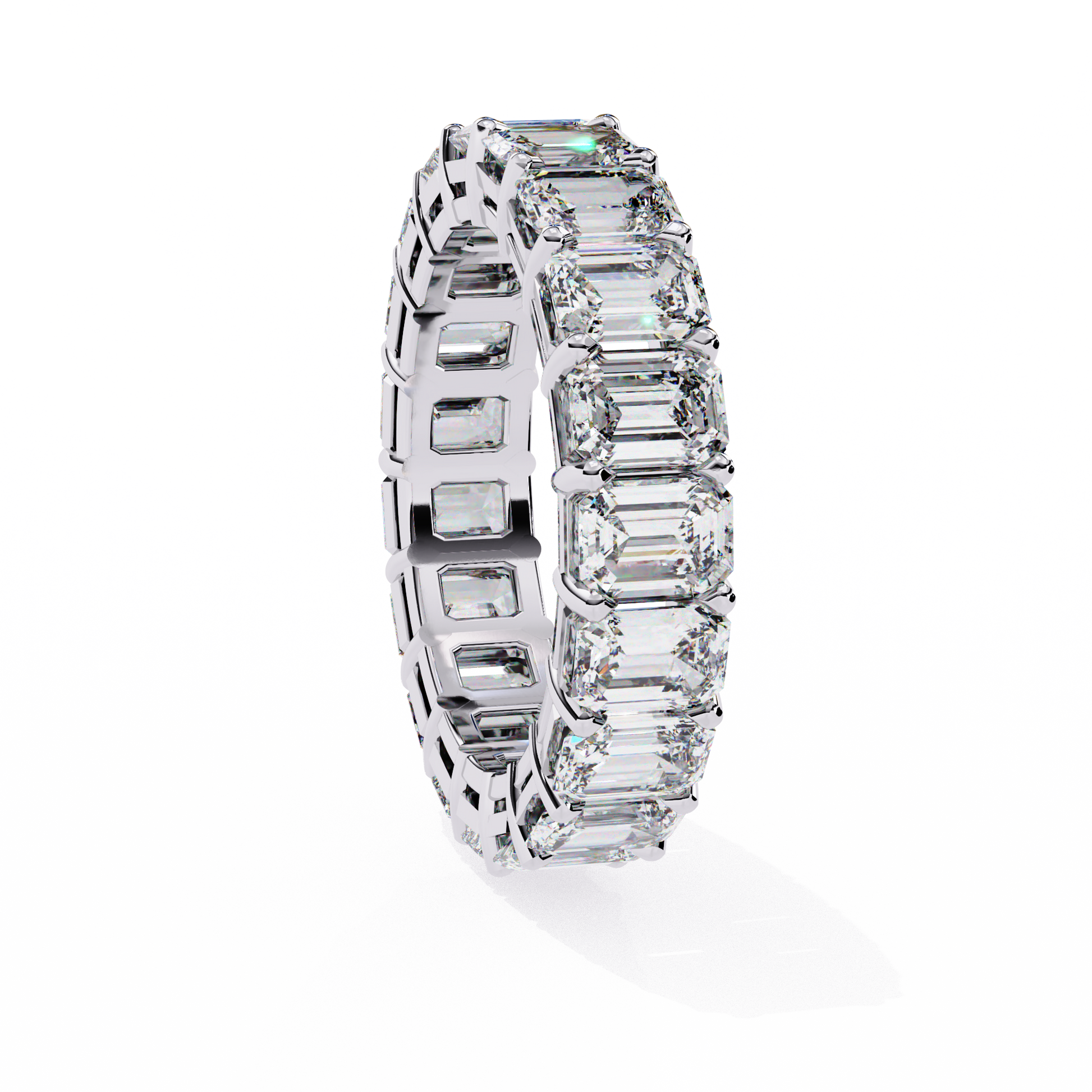 "tennis ring" features a continuous circle of magnificent Emerald-cut diamonds set vertically