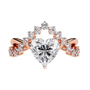 ring features a magnificent Heart-shaped diamond set atop a sophisticated dual-band V-shape architecture