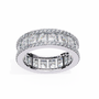 eternity band features a central line of sharp Princess-cut diamonds secured within a diamond-encrusted channel