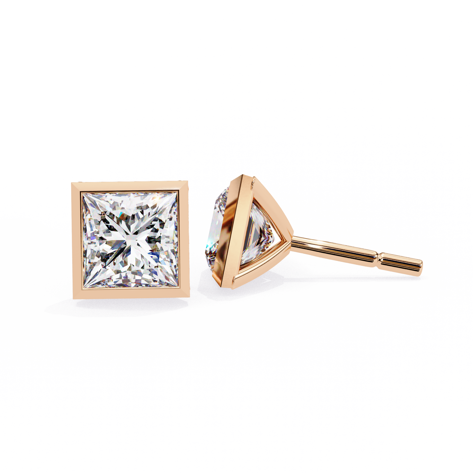 Two diamond stud earrings on a white background