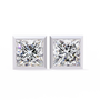 Pair of diamond stud earrings on a white background