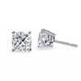 Pair of diamond stud earrings on a white background
