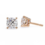 Pair of diamond stud earrings on a white background