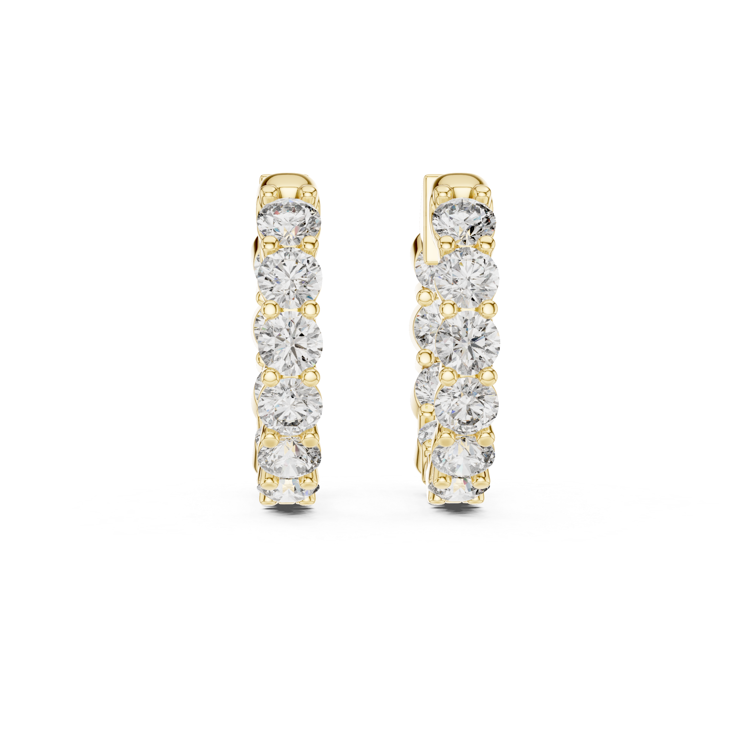 Gold hoop earrings with diamonds on a white background