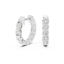 Silver hoop earrings with diamonds on a white background