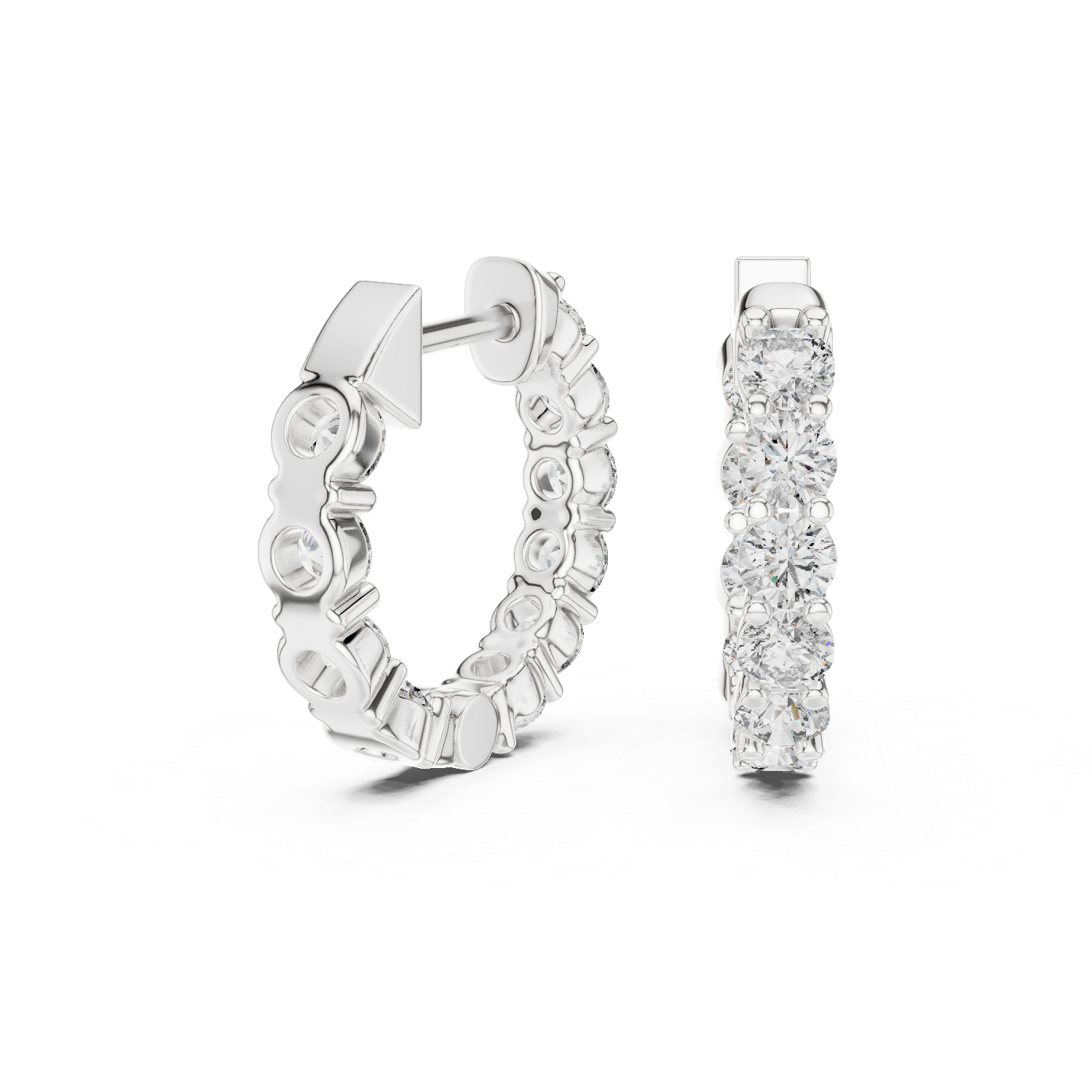 Silver hoop earrings with diamonds on a white background