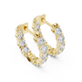 Gold hoop earrings with diamond accents on a white background