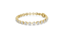 Gold bracelet with diamond accents on a white background