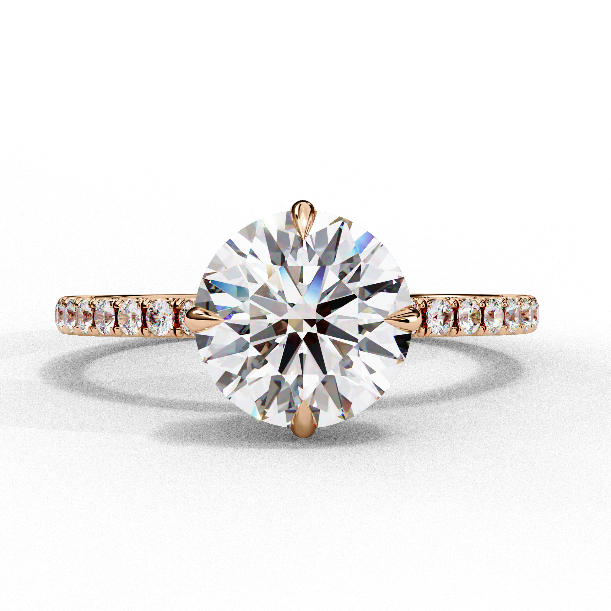 Rose gold ring with a large diamond and smaller diamonds on the band against a white background