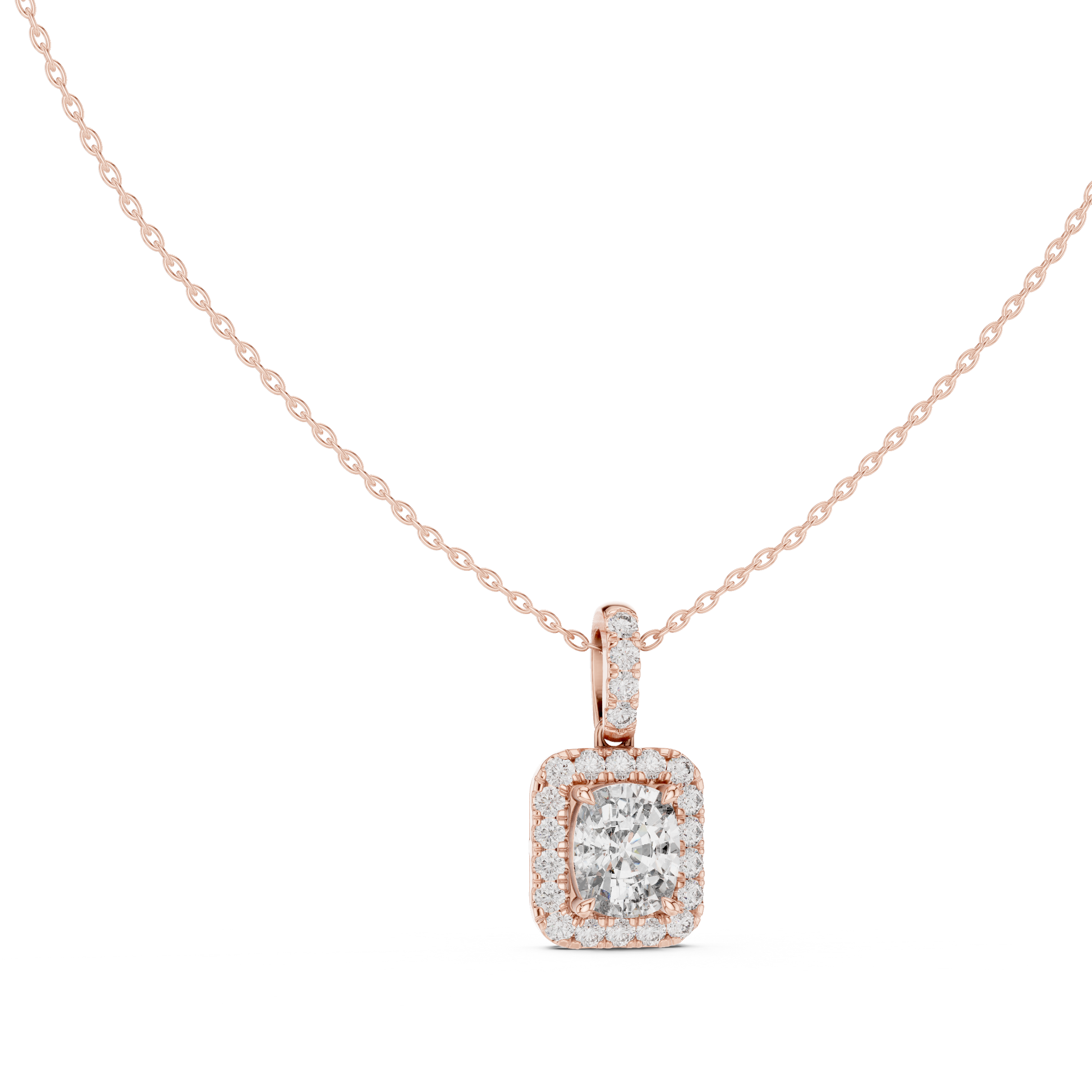 This spectacular pendant features a magnificent Cushion-cut diamond framed by a seamless closed halo of shimmering round diamonds