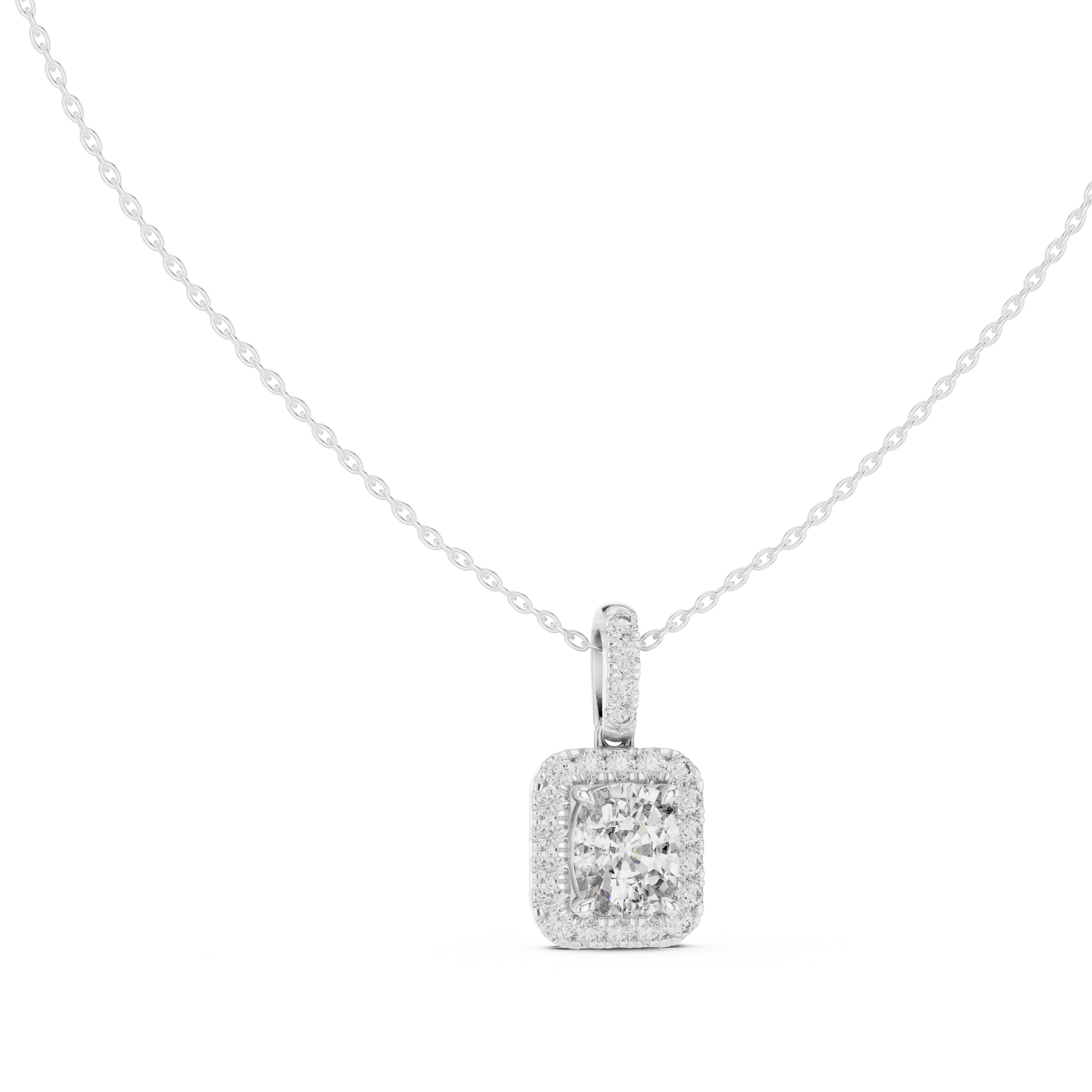 This spectacular pendant features a magnificent Cushion-cut diamond framed by a seamless closed halo of shimmering round diamonds