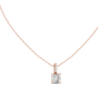 Cushion-cut diamond suspended from an elongated bail encrusted with hand-set pavé diamonds