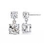 Pair of diamond earrings on a white background