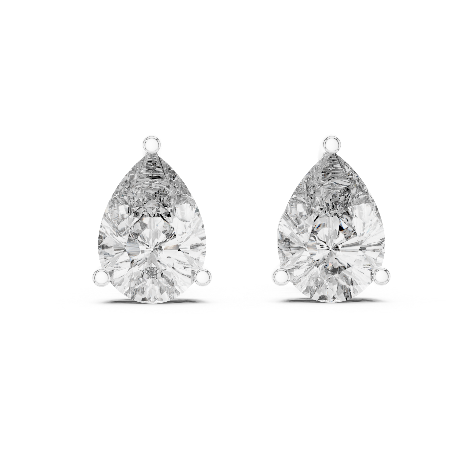 Pair of pear-shaped diamond earrings on a white background