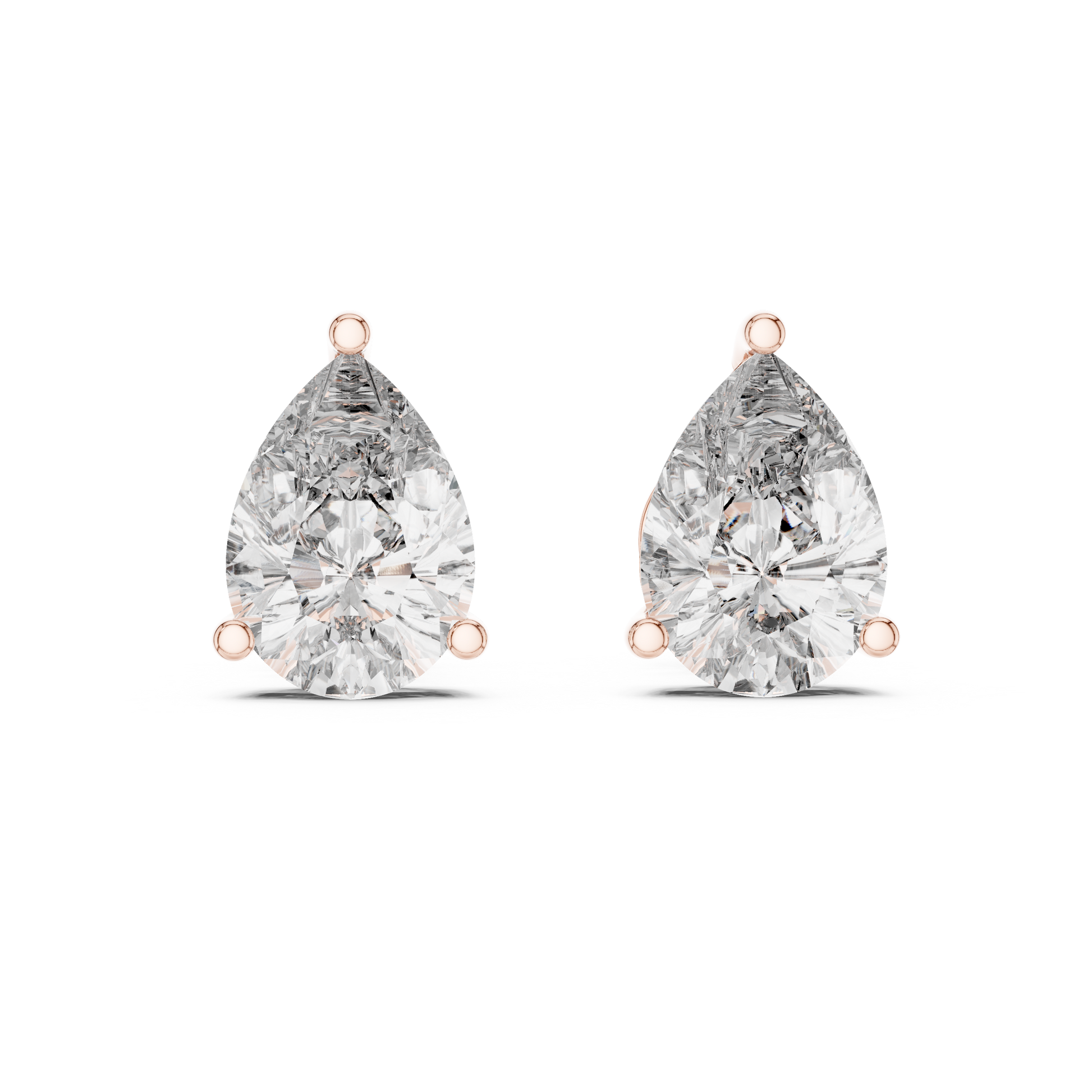 Pair of pear-shaped diamond earrings on a white background