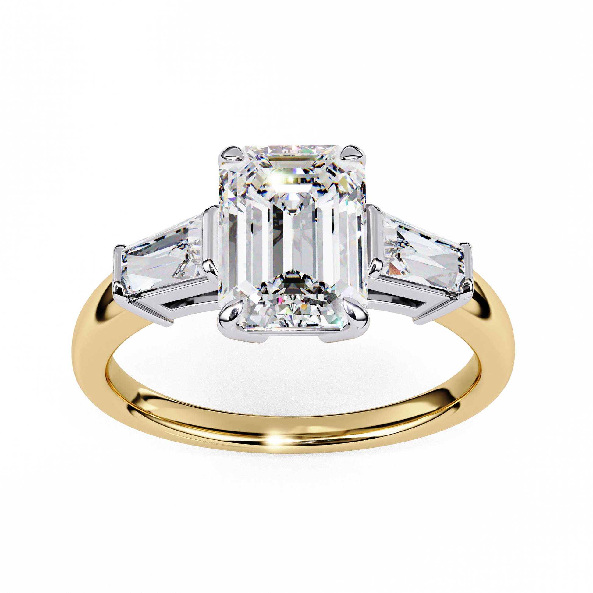 ring features a magnificent Emerald-cut centre flanked by two tapering baguette diamonds