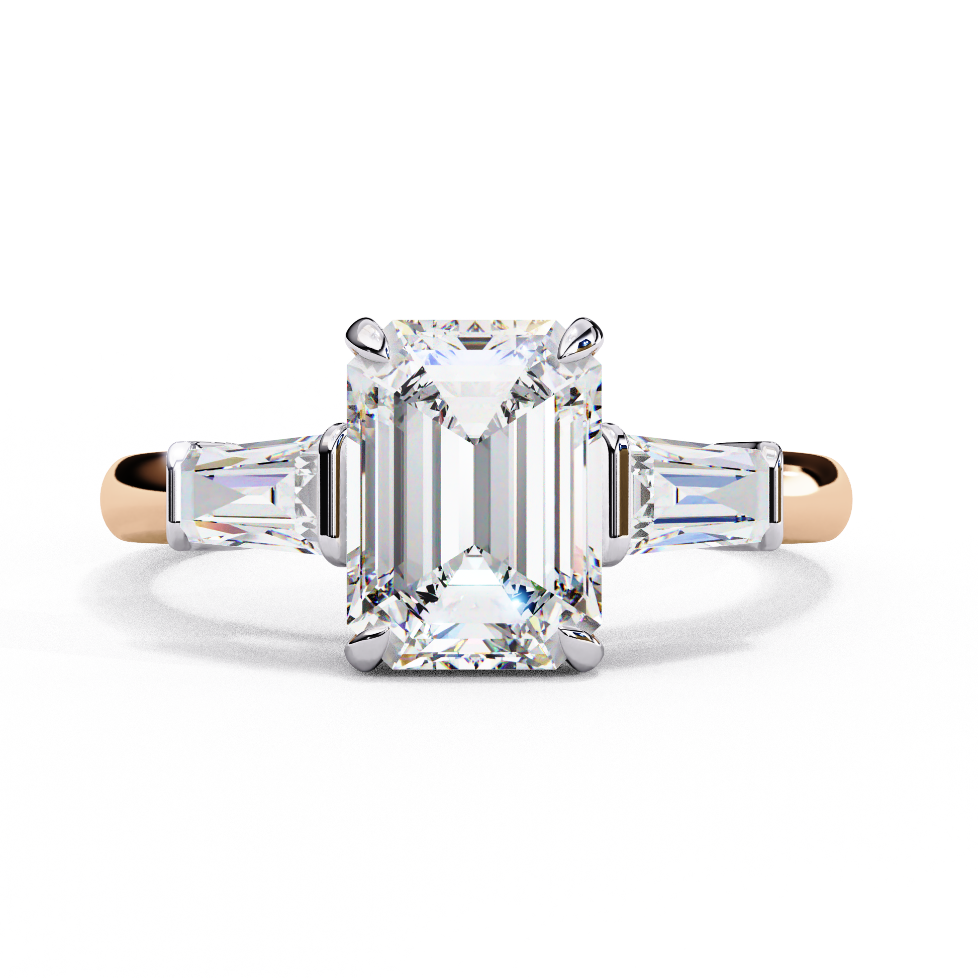 ring features a magnificent Emerald-cut centre flanked by two tapering baguette diamonds