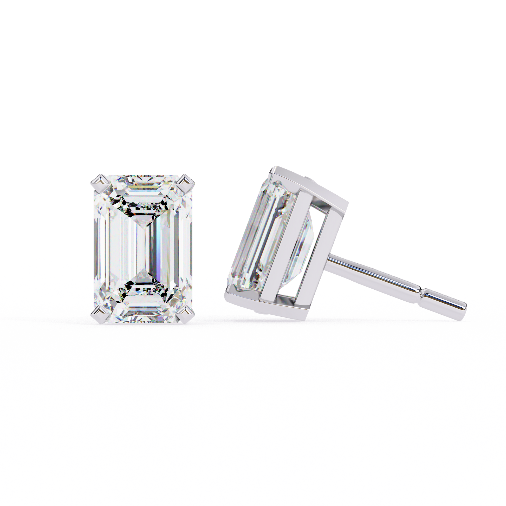 Pair of emerald-cut diamond stud earrings on a white background