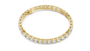 Gold bracelet with diamond accents on a white background