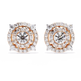 Pair of diamond earrings with rose gold accents on a white background