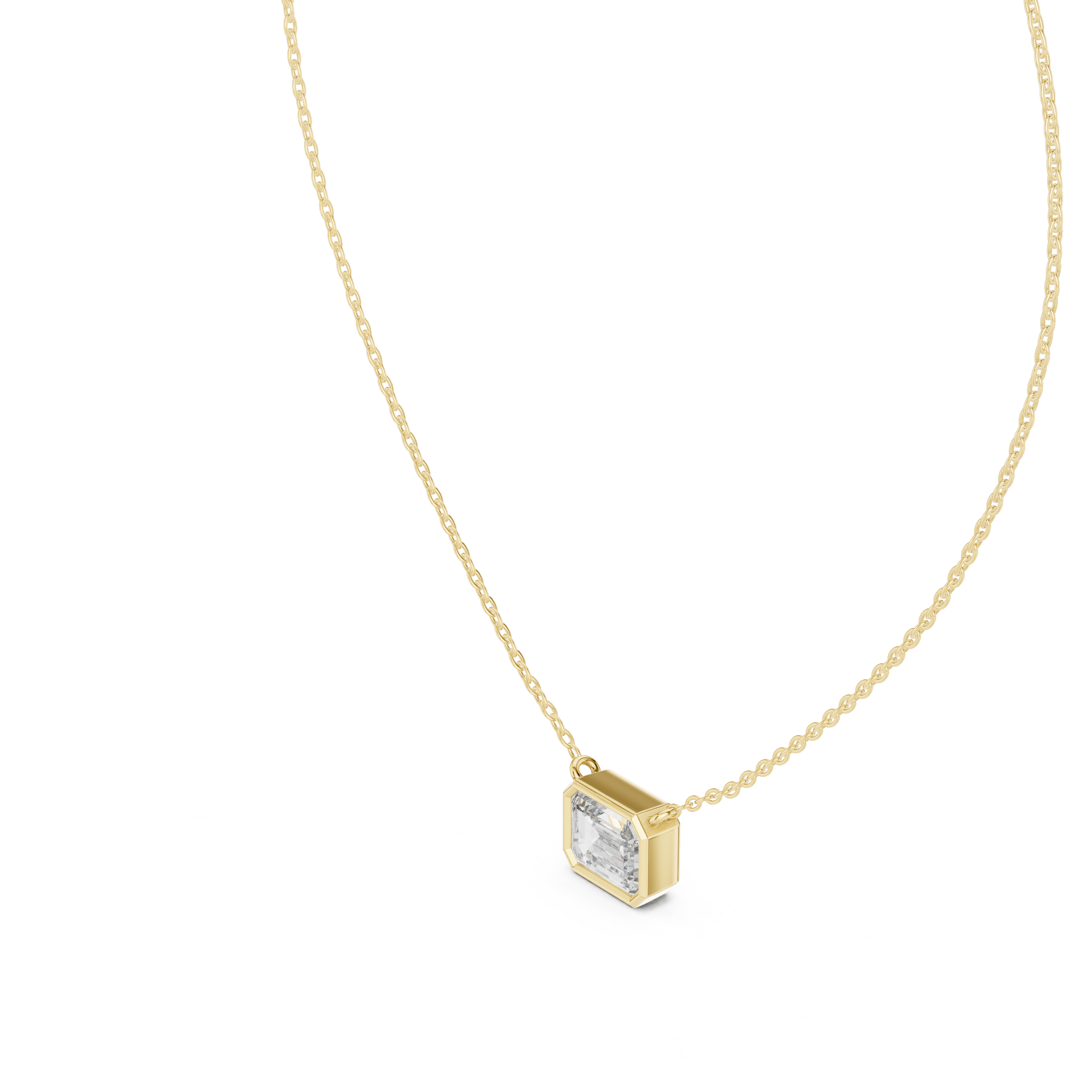 Gold necklace with a emerald pendant on a white background