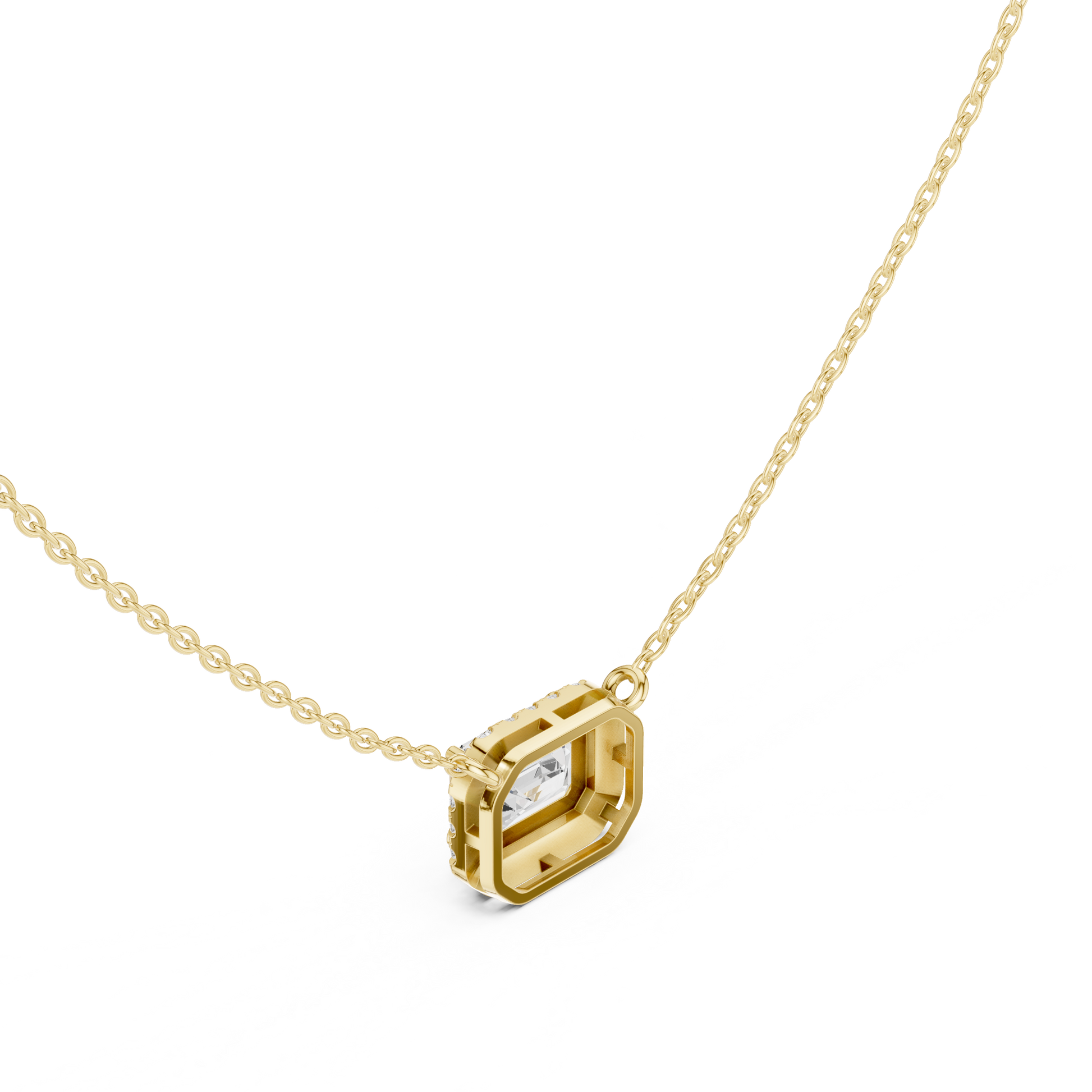 Gold necklace with a emerald diamond pendant on a white background