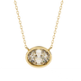 Gold necklace with a oval diamond pendant on a white background