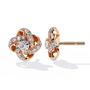 Rose gold earrings with diamond accents on a white background