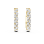 Gold hoop earrings with diamonds on a white background
