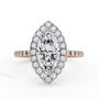 ring features a brilliant Marquise-cut solitaire encircled by a seamless halo of shimmering diamonds