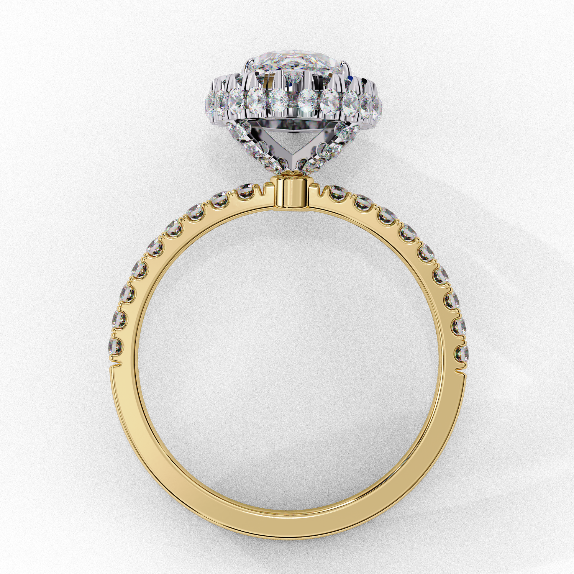 ring features a brilliant Marquise-cut solitaire encircled by a seamless halo of shimmering diamonds