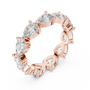 full eternity band features a unique, horizontal arrangement of Pear-cut diamonds