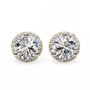Pair of round diamond stud earrings on a white background
