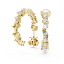 Gold earrings with diamonds on a white background