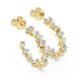 Gold earrings with diamonds on a white background