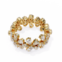 full eternity band features Pear and Round diamonds meticulously arranged into a continuous sequence of shimmering flowers