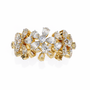 full eternity band features Pear and Round diamonds meticulously arranged into a continuous sequence of shimmering flowers