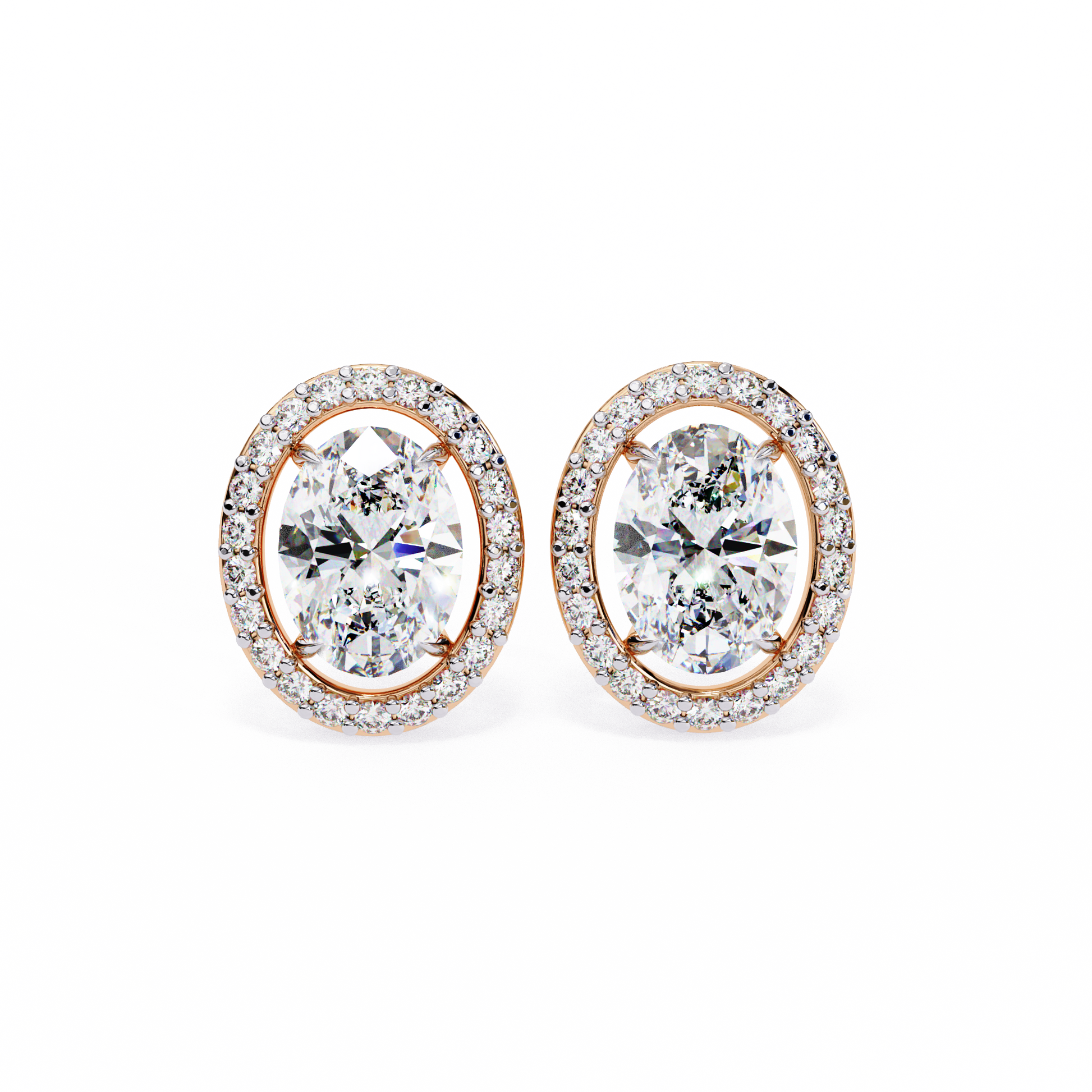 Pair of diamond earrings with rose gold setting on a white background