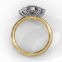 ring features an Oval Diamond centre flanked by a delicate cluster of shimmering round diamonds on either side