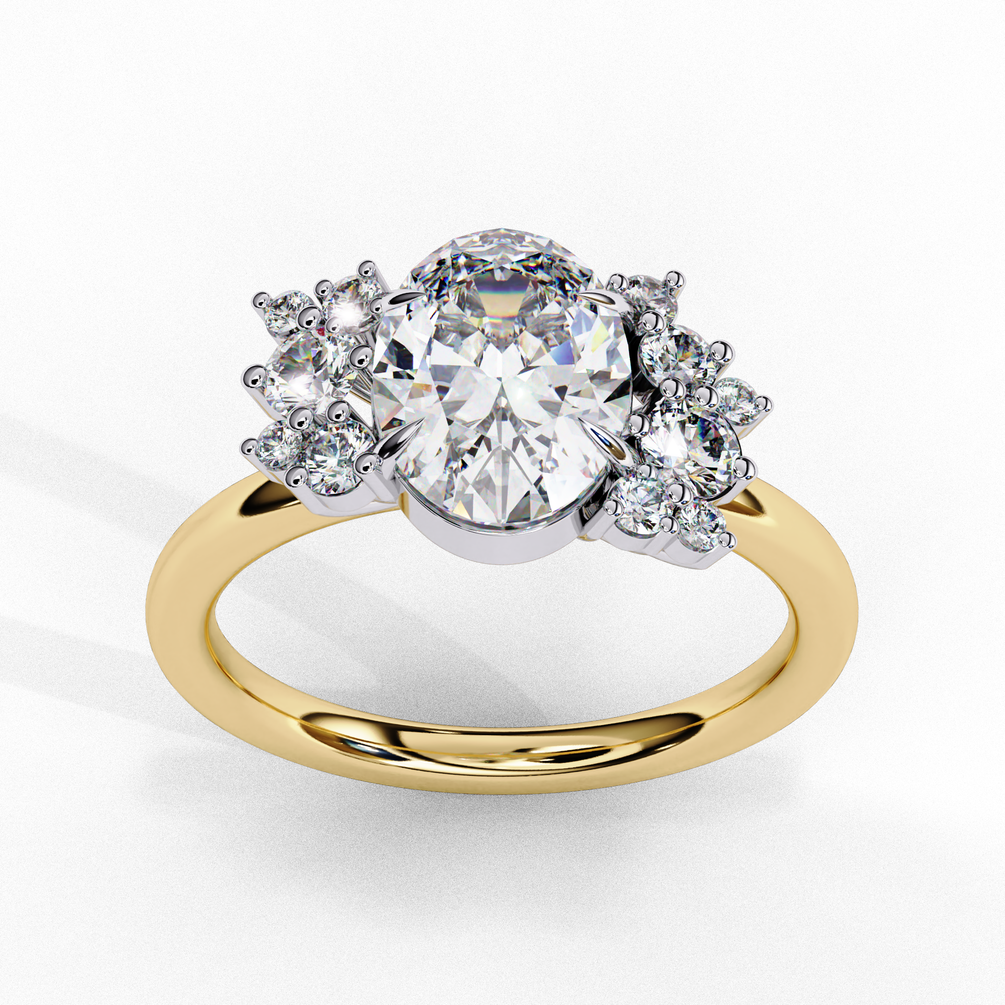 ring features an Oval Diamond centre flanked by a delicate cluster of shimmering round diamonds on either side