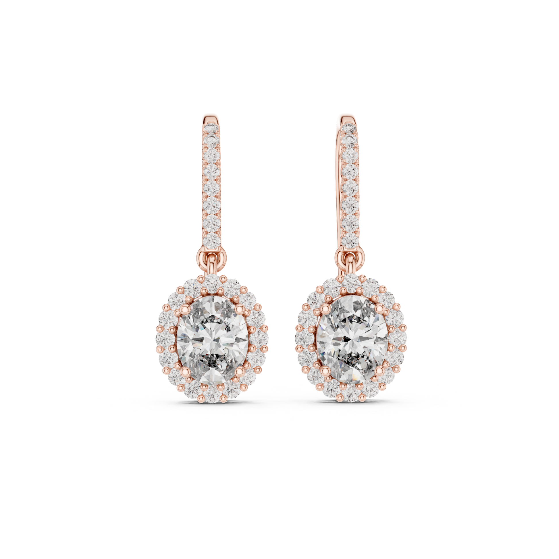 Oval Diamond Halo Drop Earrings. Crafted in radiant 18K Gold, a brilliant Oval-Cut Diamond is framed by a luminous pavé halo, maximising its size and fire