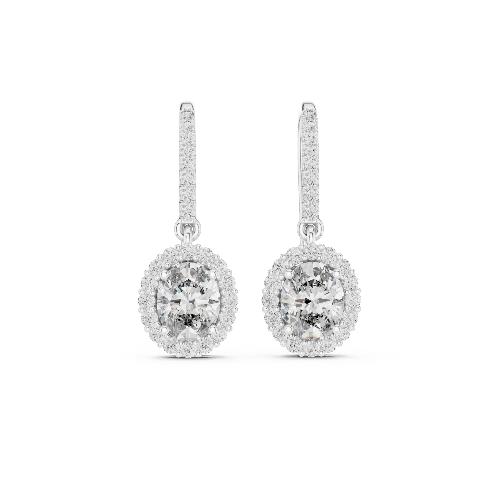 Oval Diamond Halo Drop Earrings. Crafted in radiant 18K Gold, a brilliant Oval-Cut Diamond is framed by a luminous pavé halo, maximising its size and fire